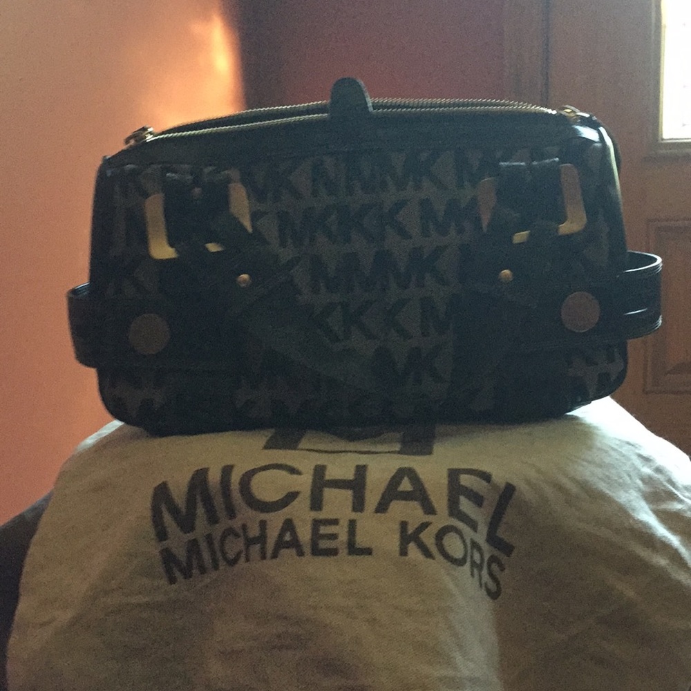 MK brown medium satchel.